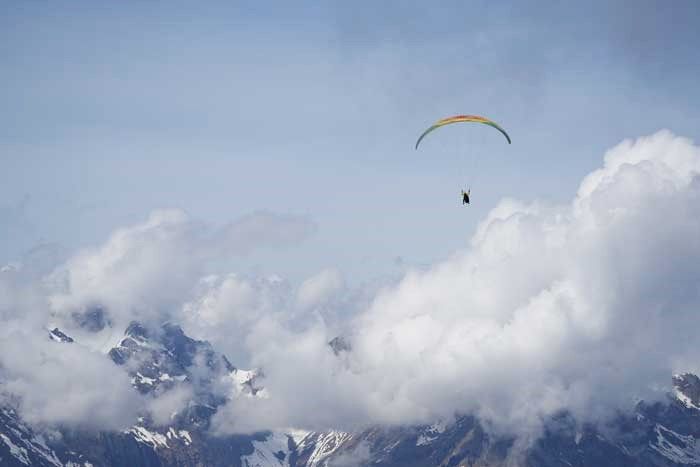 Paraglider over the cloud